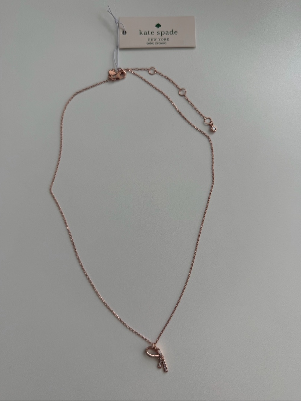Kate Spade rose gold bow necklace